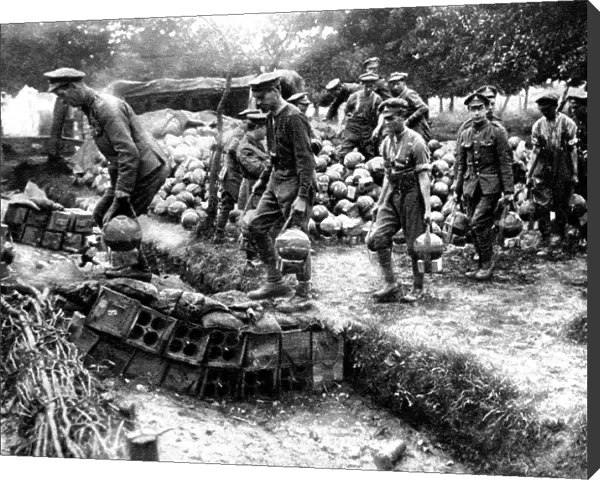 British soldiers carrying trench-mortar ammunition