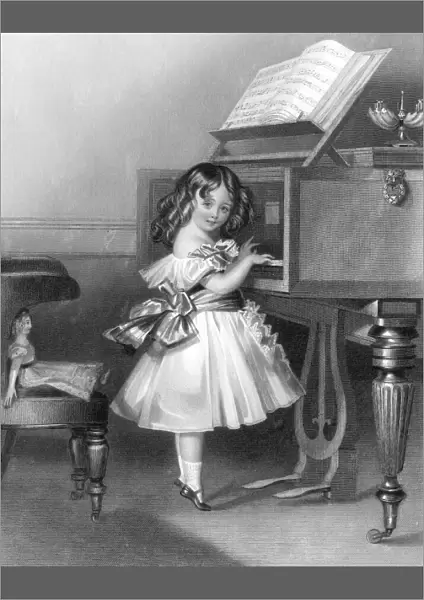 Music at home - little girl at the piano