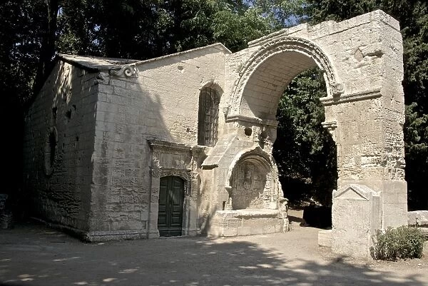Arch of the 12th century Saint Cesaire Abbey, Alyscamps, A gallo-roman necropolis, Arles, Bouches du Rhone, Provence, France, Europe