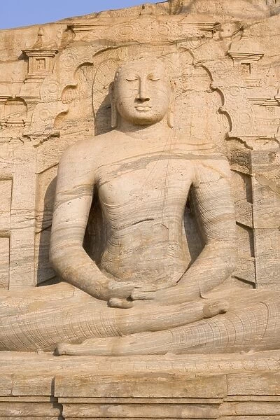 Rock carved granite image of the seated Buddha