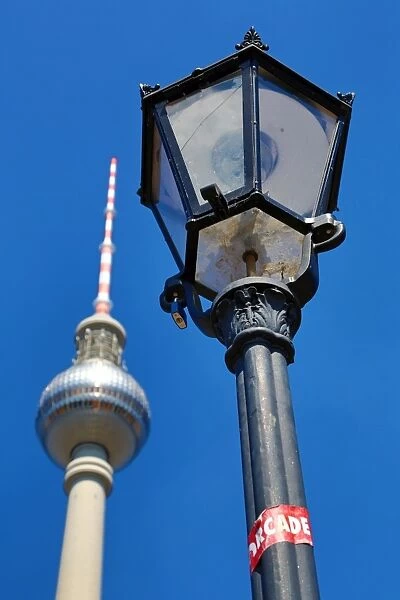 Berlin TV Tower, Fernsehturm, television tower and a lamppost in Berlin, Germany