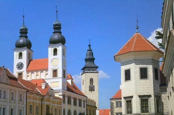 Church and castle in Old town square surrounded by 16th-century Renaissance houses