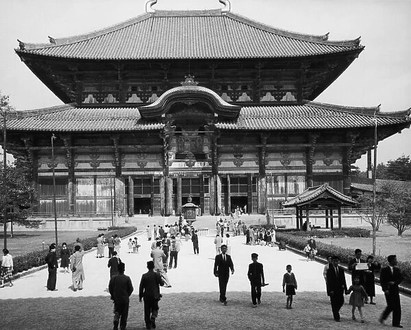 The Hall of the Great Buddha at the Todaiji Temple in Nara, Japan. The hall is the largest wooden structure in the world. Photograph, c1965