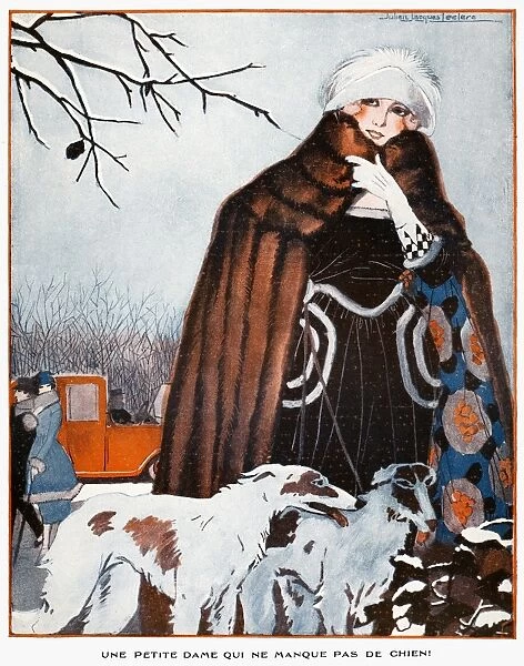 PARISIAN STYLE, 1921. Au Coin du Bois. A fashionable young Parisian and her dogs in the Bois de Boulogne. Illustration by Julien Jacques Leclerc from La Vie Parisienne, 1921