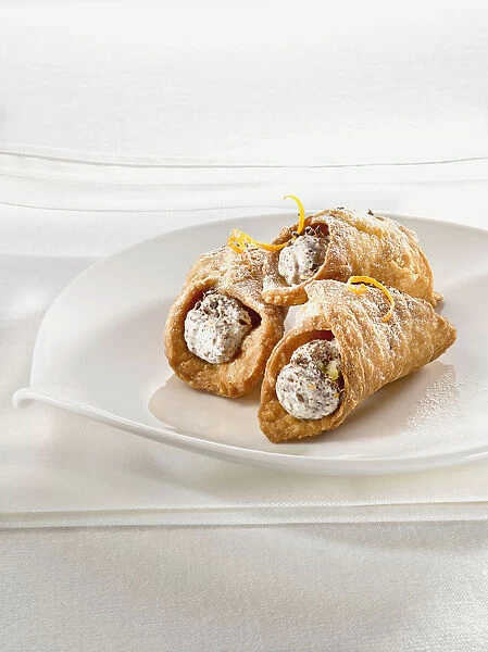 Cannolis on plate, close-up