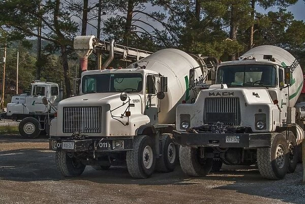 3 x cement mixers parked up on waste ground on Manitoulin Island Ontario Canada