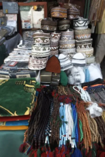 Buy Islamic items including prayer mats and Muslim caps