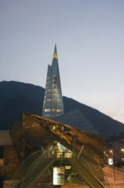 Buy Caldea Hot Spring Complex lit up in the evening