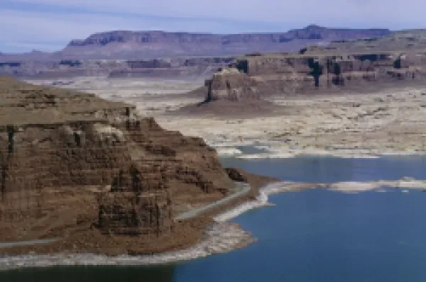 Buy State Highway 95 passes through eroded sandstone landscape