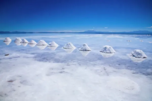 Buy Bolivia, Southern Altiplano, Salar de Uyuni. Cones of salt stacked on the Salar de Uyuni salt flat.