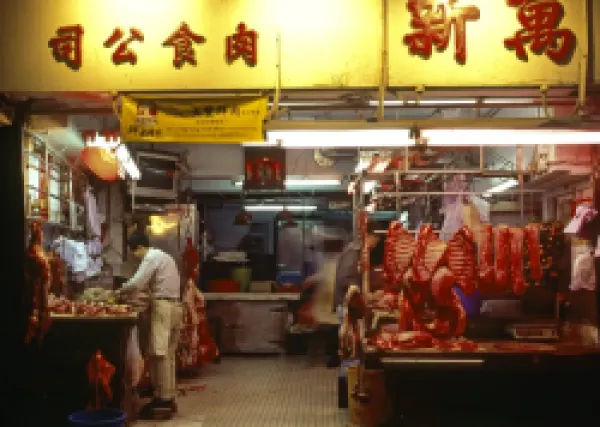 Buy Early morning activity in a chinese butchery in the