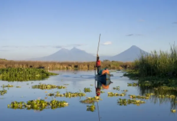 Buy Fisherman, Agua and Pacaya Volcanoes in the background