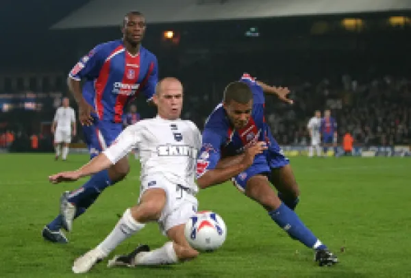 Charlie Oatway tackles Tom Soares