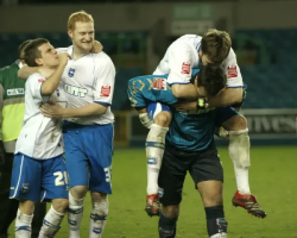 Team Celebrate winning at Millwall in the JPT