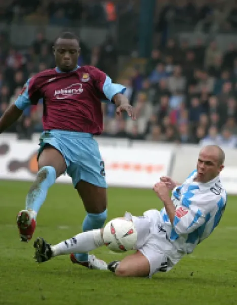 Charlie Oatway tackles Nigel Reo-Coker of West Ham (2004/05)