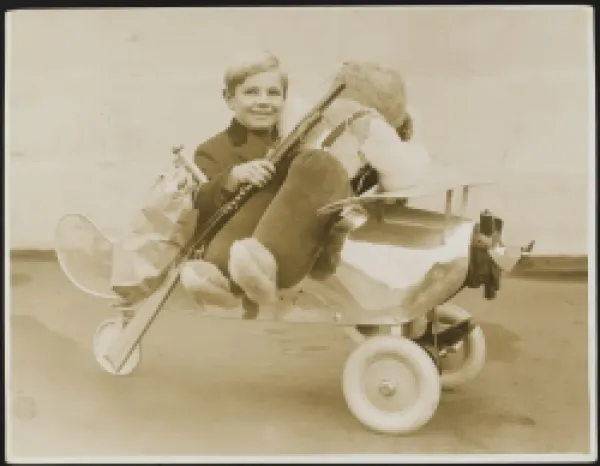 Buy CHILD IN MODEL AEROPLANE
