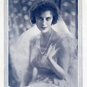 Actress Beatrice Lillie pictured in 1920 in The Tatler following her 1919 marriage to