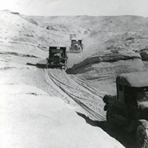 Cars on a dusty road, Palestine, WW1
