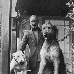 Cecil Aldin with two dogs