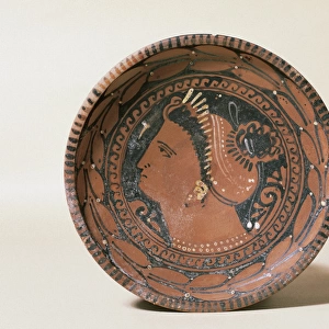 Ceramic plate. Decorated head matron. Greek imitation. 3rd c