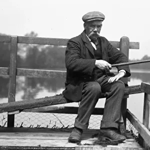 Edwardian man with fishing rod at Ellesmere, Shropshire