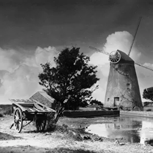 The lovely old windmill at Rhosneigr, Isle of Anglesey, Wales. Date: 1939