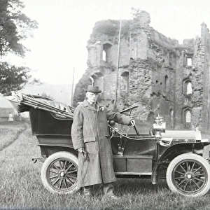 Man with early car, Crickhowell Castle, Powys, Mid Wales