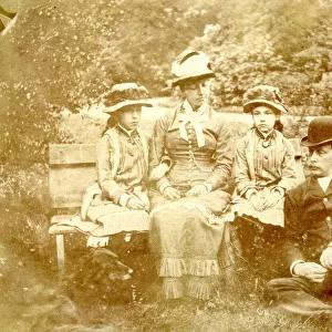 Unhappy Victorian family in a garden