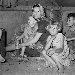 White migrant mother with children. Weslaco, Texas