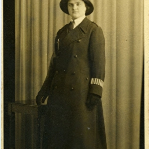 Woman police officer in studio photo