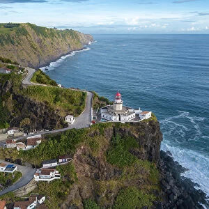 Aerial view of Farol do Arnel lighthouse and fishermen huts, Sao Miguel island, Azores, Portugal, Atlantic, Europe