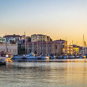 Dusk light over moored boats in the harbour, Chania, Crete, Greek Islands, Greece, Europe