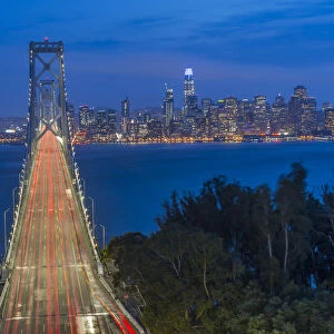 View of San Francisco skyline and Oakland Bay Bridge from Treasure Island at night