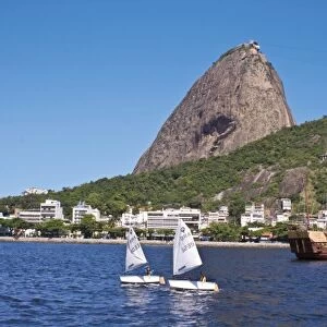 Rio de Janeiro, Brazil, View of Sugar Loaf Mountain by boat in Botafogo Bay. Two