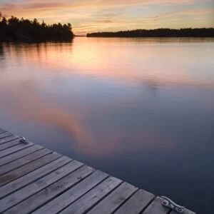 Sunset from wooden dock, Whispering Pines, Lake Kabetogama, Voyageurs National Park