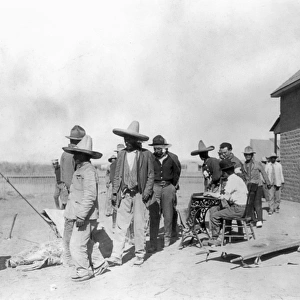 MEXICAN REFUGEES, 1914. U. S. soldiers interviewing Mexican refugees at Fort Bliss