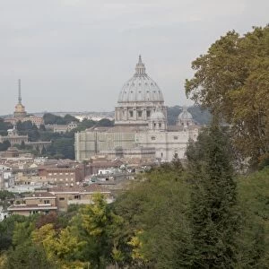 Italy, Rome, Vatican City and St. Peters Basilica seen from Piazza Garibaldi in the Janiculum