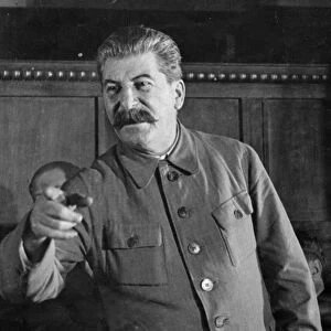Joseph stalin giving a speach at a session of the commission for studying the project of the model constitution of agricultural artels during the second all-union congress of collective farm shock-workers, april 1935