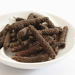 Long pepper in a small porcelain bowl