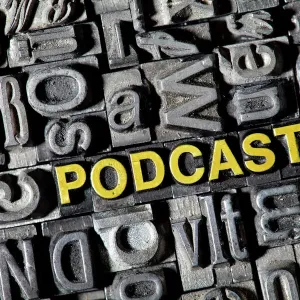 Old lead letters forming the word Podcast