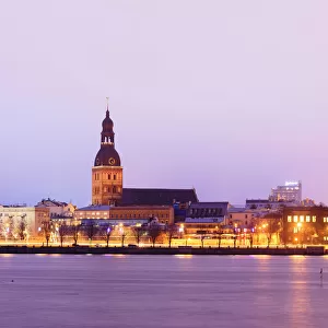 Old Riga skyline at dusk and Daugava river. Riga, Latvia