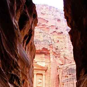 Petra Archaeological site - The Treasury seen from the Siq exit