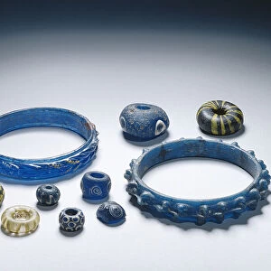 Bracelets and beads, Iron Age (glass)