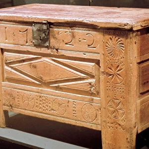 Furniture: carved peasant chest used to store linen. 1722
