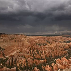 A thunderstorm drops heavy rain over the hoodoo sandstone formations. Bryce Canyon National Park