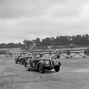 Frazer-Nash BMW 328 and Riley at the chicane, JCC Members Day, Brooklands, 1939. Artist