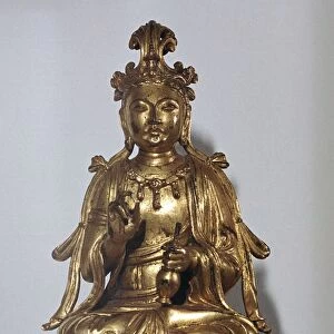 A gilt-bronze statuette of a Bodhisattva on a lotus leaf, 10th century