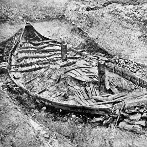 Stern view of the Oseberg Viking ship after months of excavation, Norway, c1904-1905