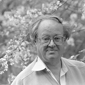 Author, playwright and creator of Rumpole of the Bailey John Mortimer, seen here at home