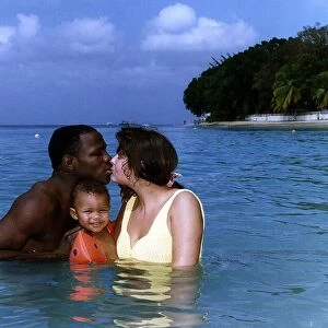 Chris Eubank Boxer in the sea in barbados with his wife Karron and son Chistopher